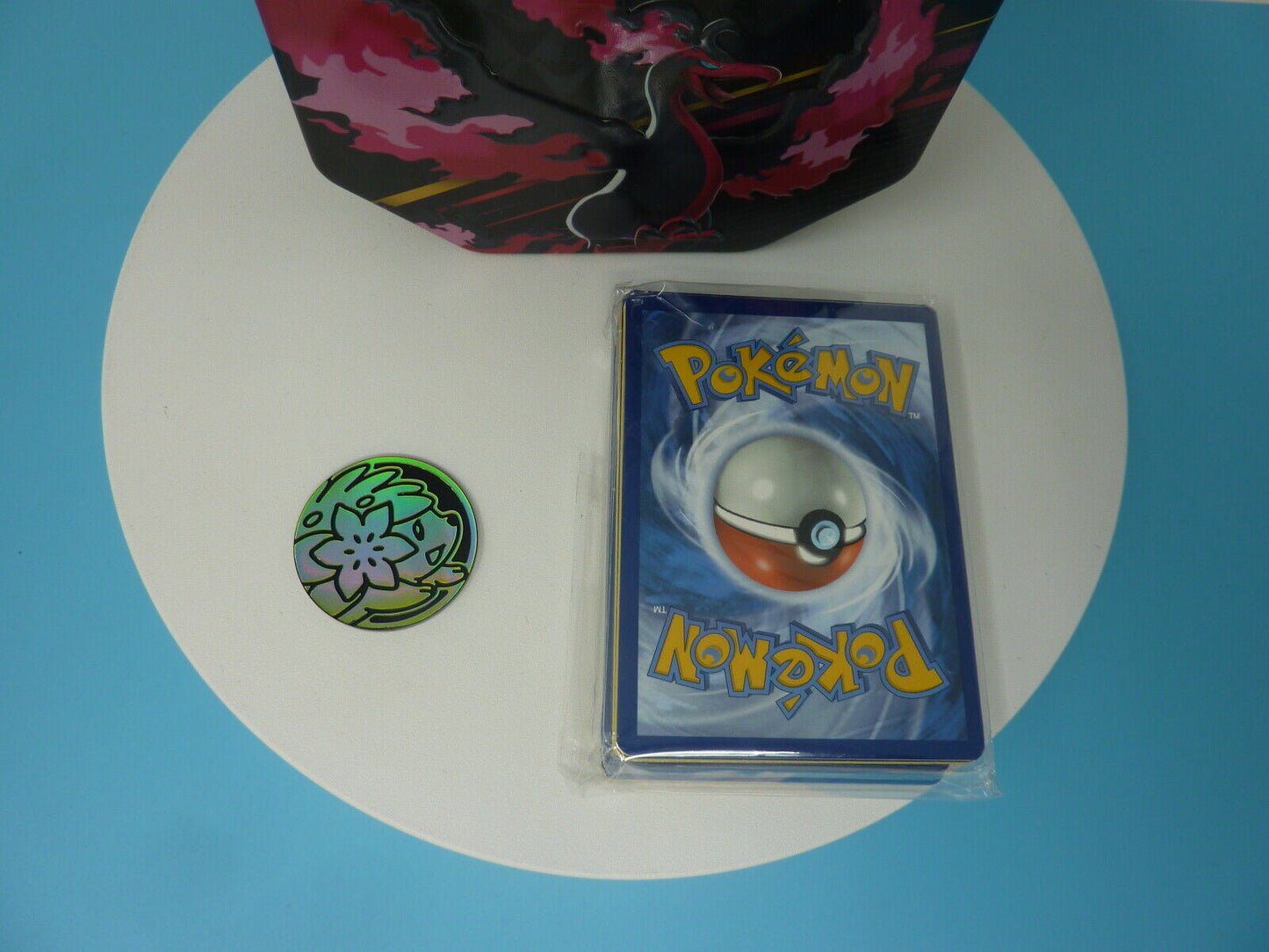 pokemon tin and cards