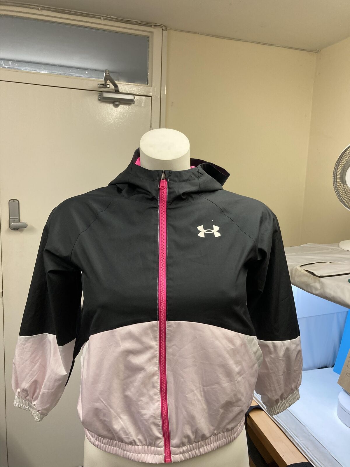 Girl's Under Armour UA Woven Lightweight Full-Zip Hooded Jacket in Black SMALL