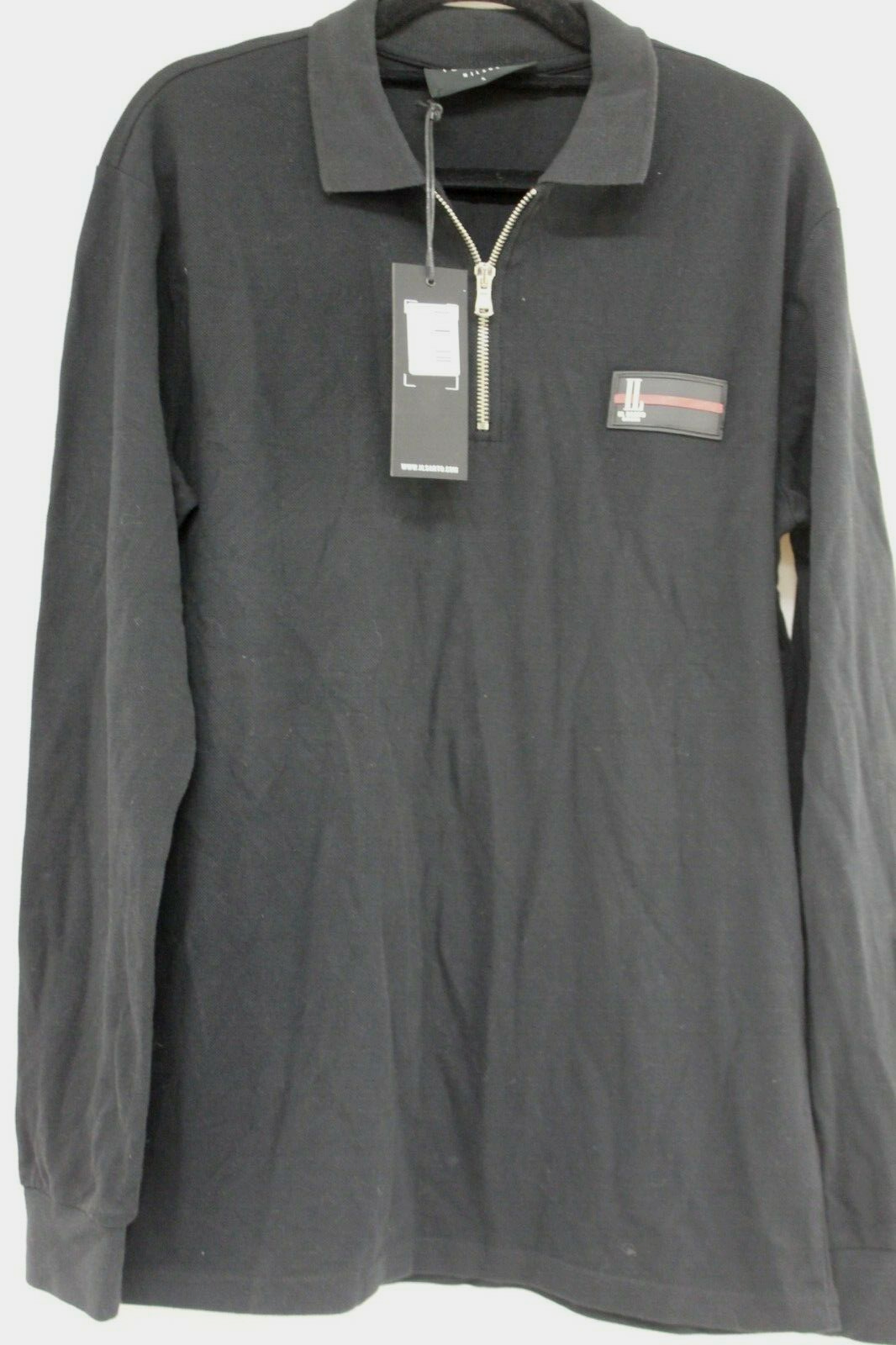 Il Sarto luxe badge long sleeve polo in black Small
