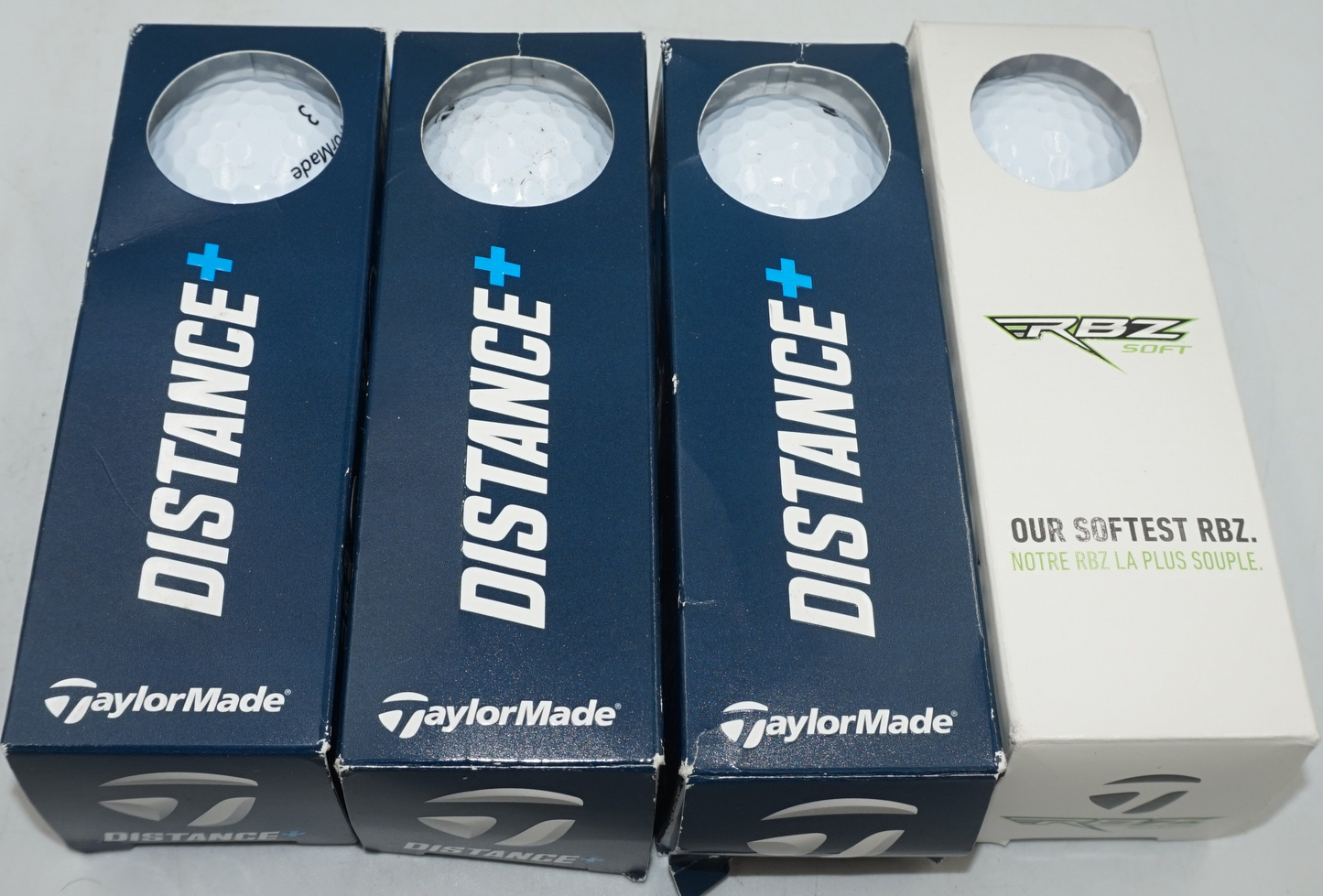 Pack of 12 TaylorMade golf balls 9 distance plus + 3 RBZ soft golf balls