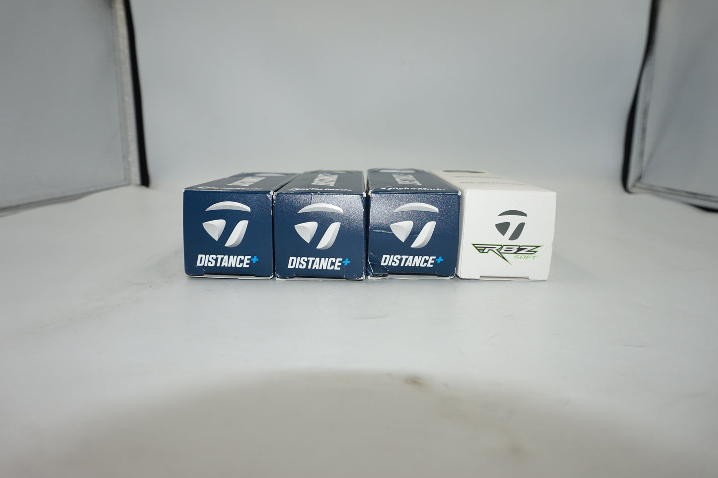 Pack of 12 TaylorMade golf balls 9 distance plus + 3 RBZ soft golf balls