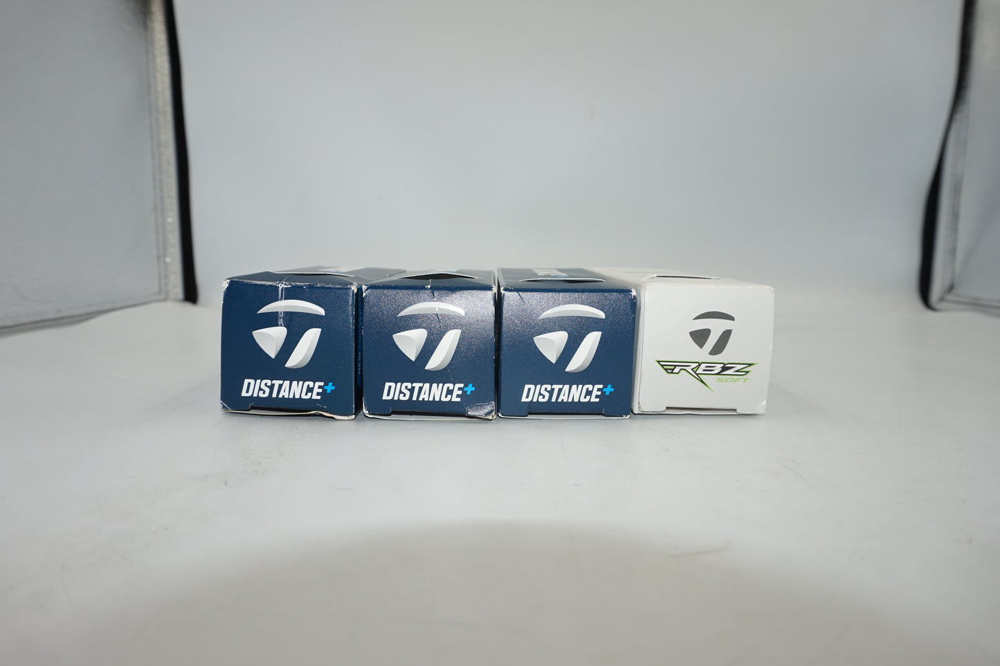 Pack of 12 TaylorMade golf balls 9 distance plus + 3 RBZ soft golf balls