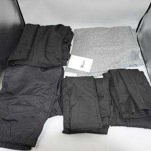Job lot of 19 pairs of various trousers