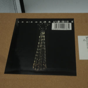 Metal cone shaped Christmas tree