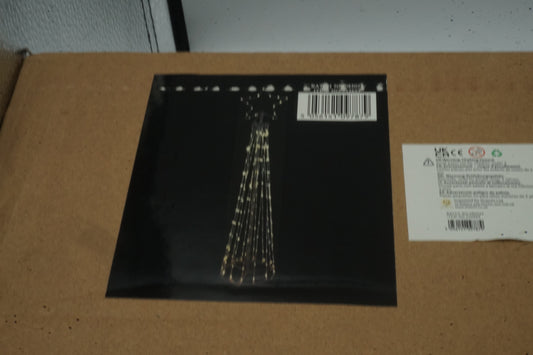 Metal cone shaped Christmas tree