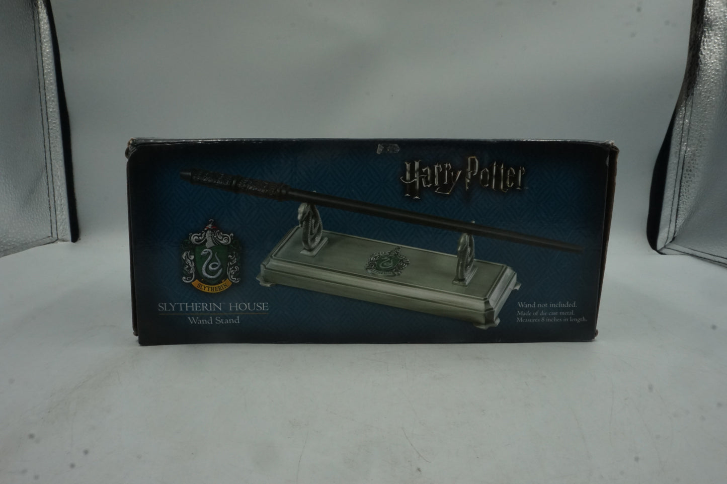 the noble collection harry pooter 8" die cast metal Slytherin house wand stand