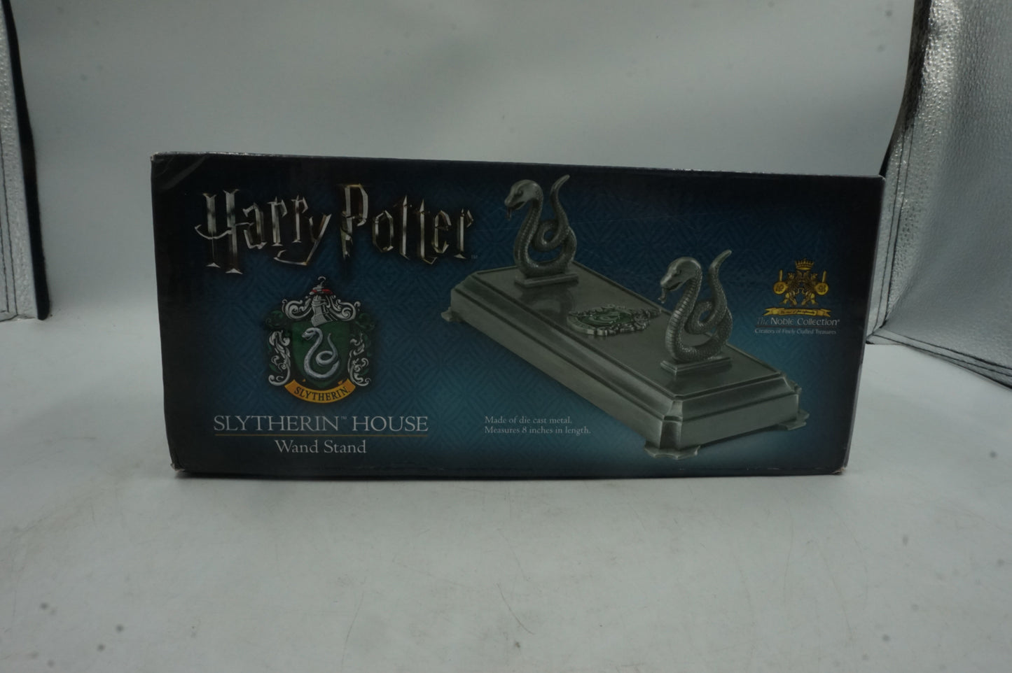 the noble collection harry pooter 8" die cast metal Slytherin house wand stand