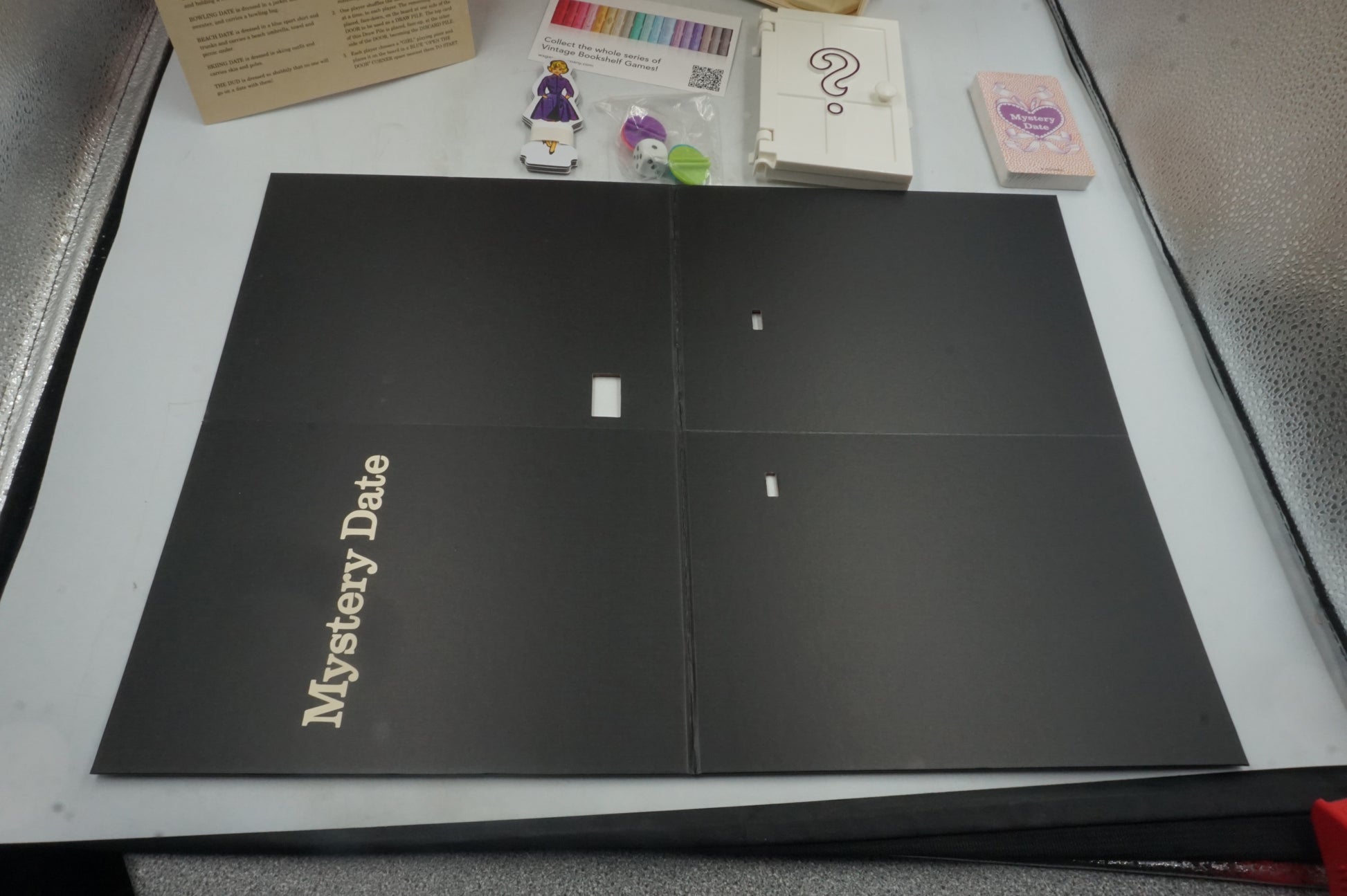 Winning solutions: Mystery date game vintage bookshelf edition