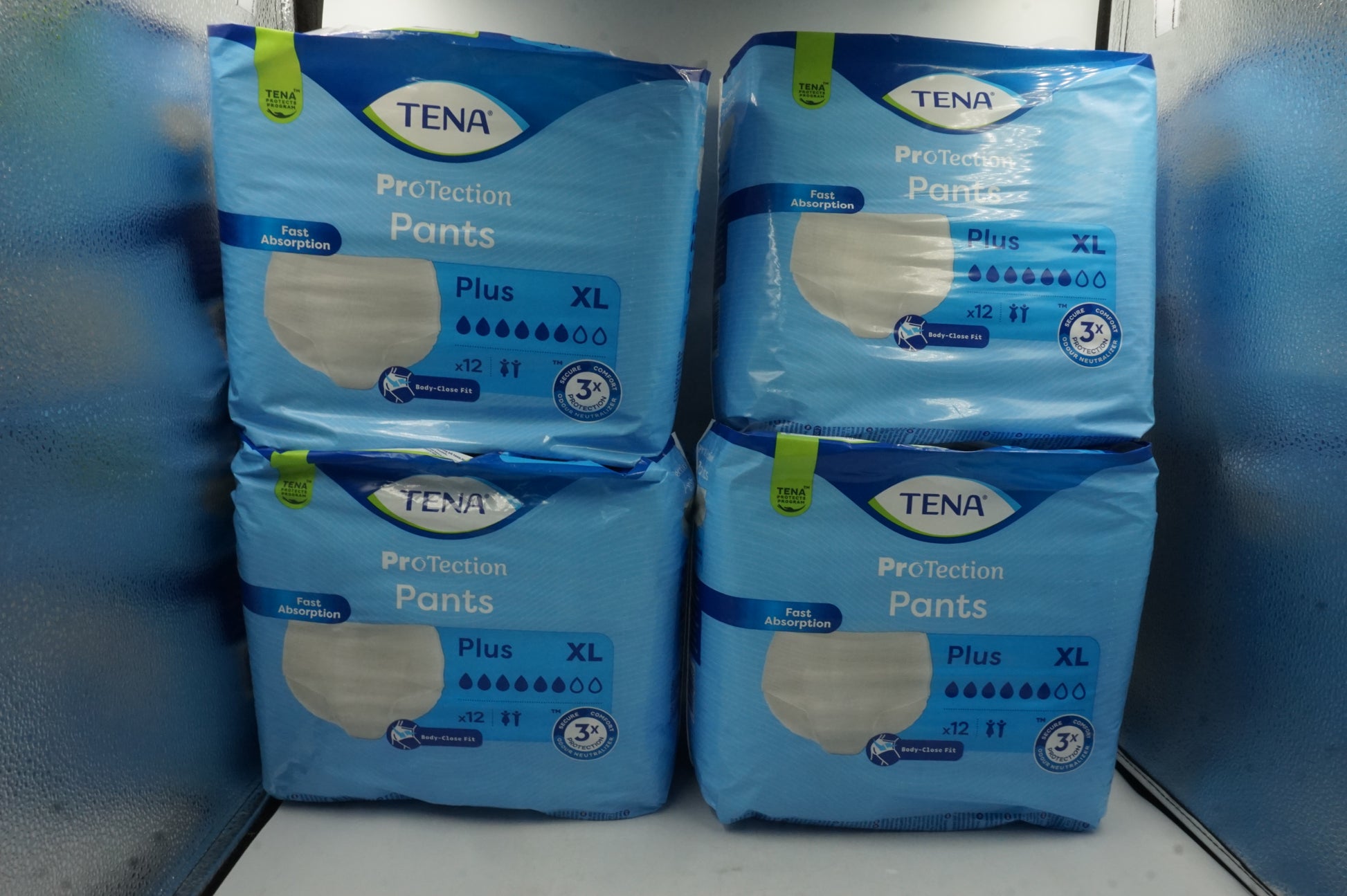 pack of 4 unisex 3x protection TENA protection pants plus XL X12