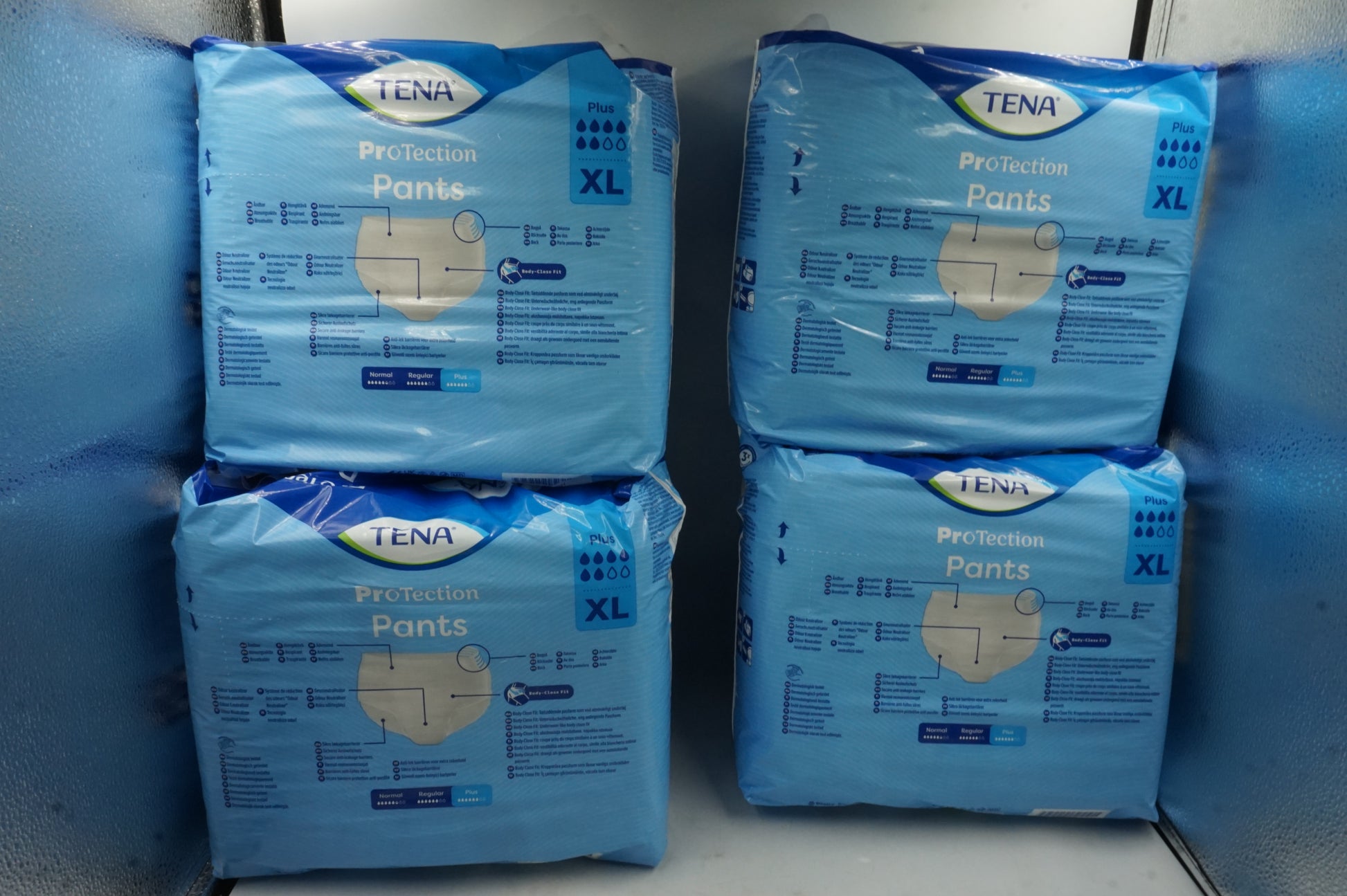 pack of 4 unisex 3x protection TENA protection pants plus XL X12
