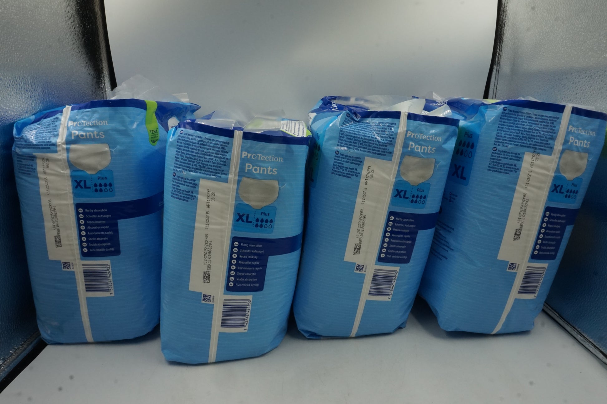pack of 4 unisex 3x protection TENA protection pants plus XL X12