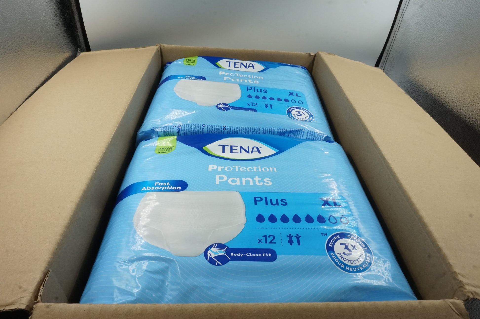pack of 4 unisex 3x protection TENA protection pants plus XL X12