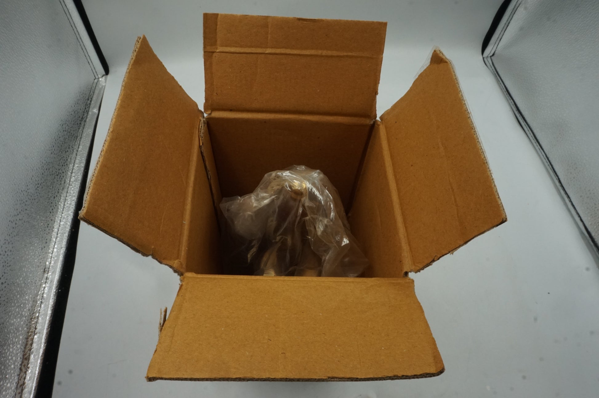 handheld brass bell with wooden handle