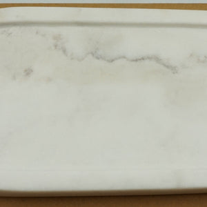 white marble oval bathroom tray