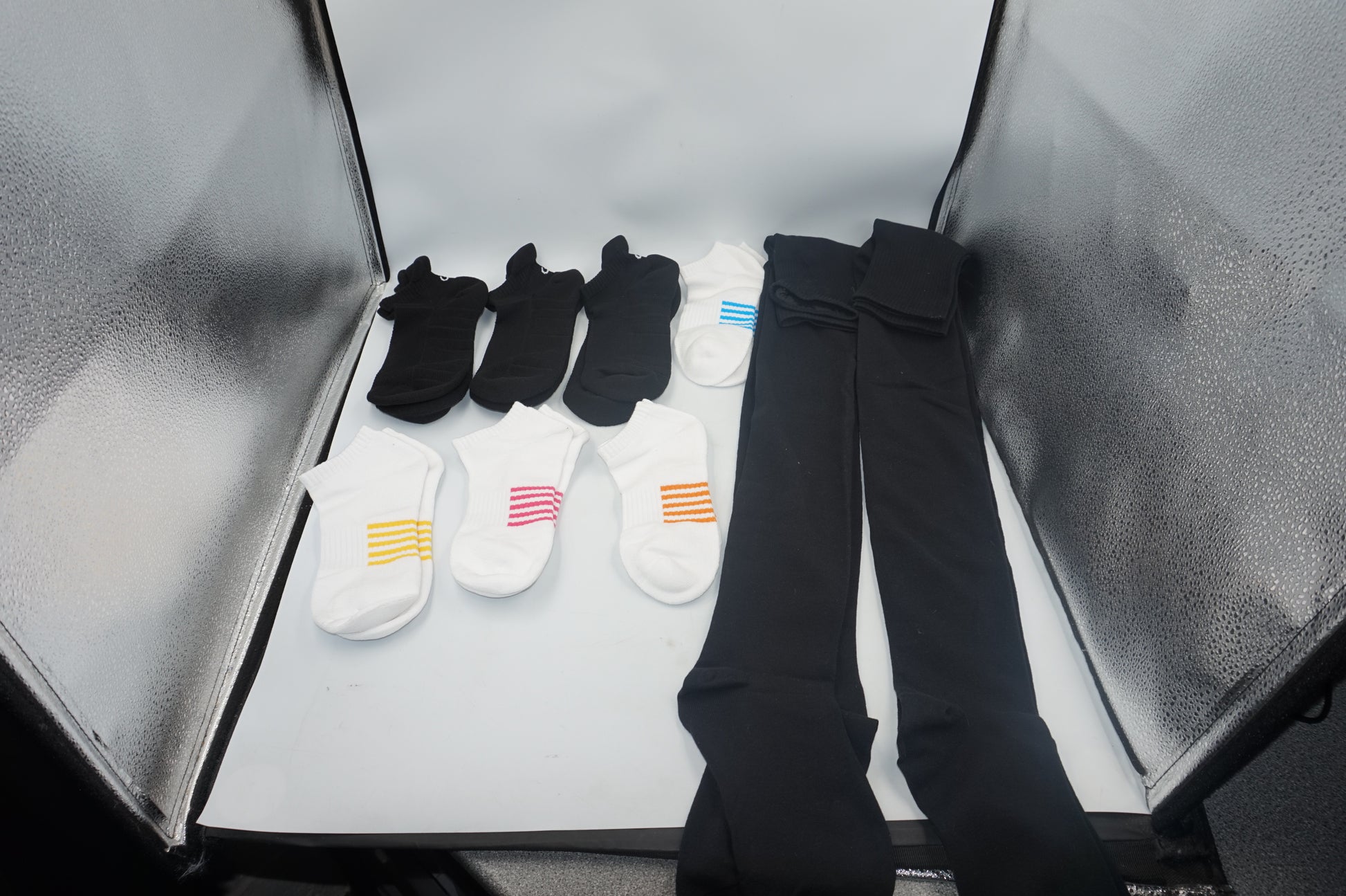 Job lot of ~125 pairs of various socks