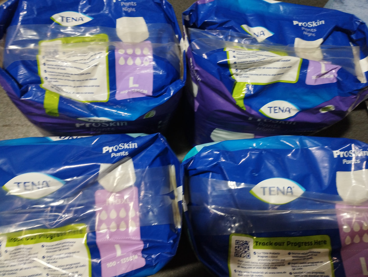 4pks of tena proskin/night pants LARGE