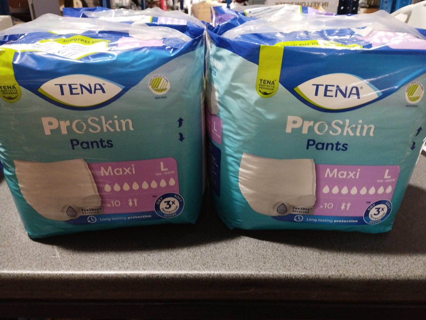 4pks of tena proskin/night pants LARGE